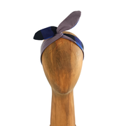 Bandeau bleu de la marque écoresponsable La Machine à récup qui revalorise des tissus avec la participation d'ateliers solidaires.