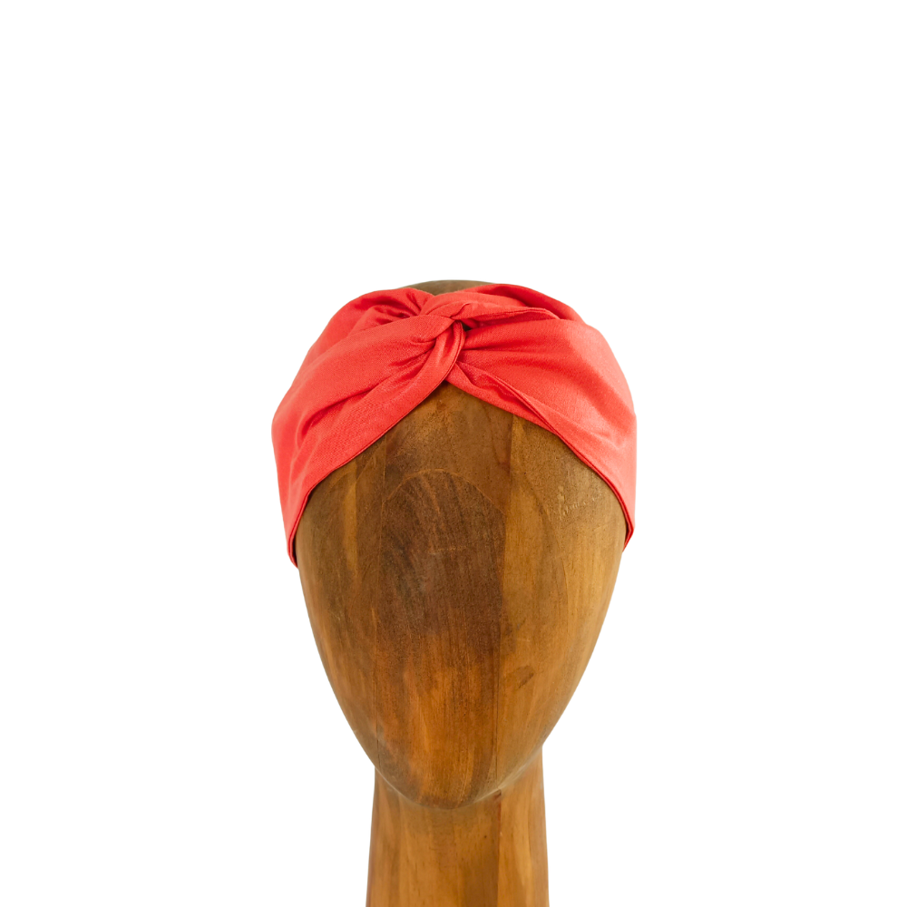 bandeau cheveux orange avec armature de la marque écoresponsable La Machine à récup qui revalorise des tissus avec la participation d'ateliers solidaires.