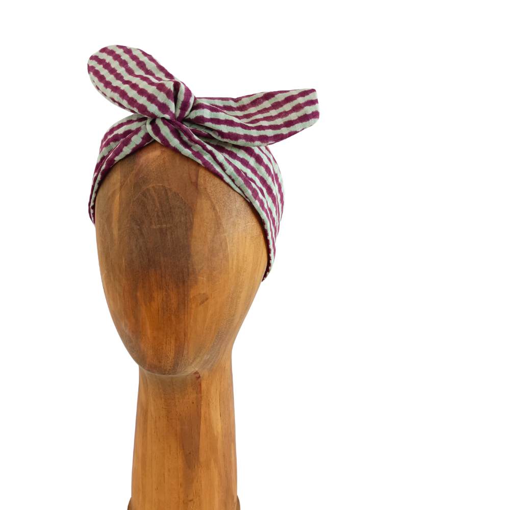 La Machine à récup' propose des accessoires écoresponsables et upcyclés cousus avec la participation d'ateliers de couture solidaires, comme ce bandeau cheveux vintage