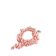 Le chouchou avec nœud amovible de la Machine à récup' est un accessoire conçu avec des tissus issus du réemploi et cousu avec la participation d'ateliers de couture solidaires en Sarthe