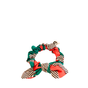 Le chouchou nœud pour les cheveux de la Machine à récup' est un accessoire conçu avec des tissus issus du réemploi et cousu avec la participation d'ateliers de couture solidaires en Sarthe