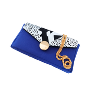Petit sac bandoulière femme, de la marque écoresponsable La Machine à récup qui revalorise des tissus avec la participation d'ateliers solidaires.