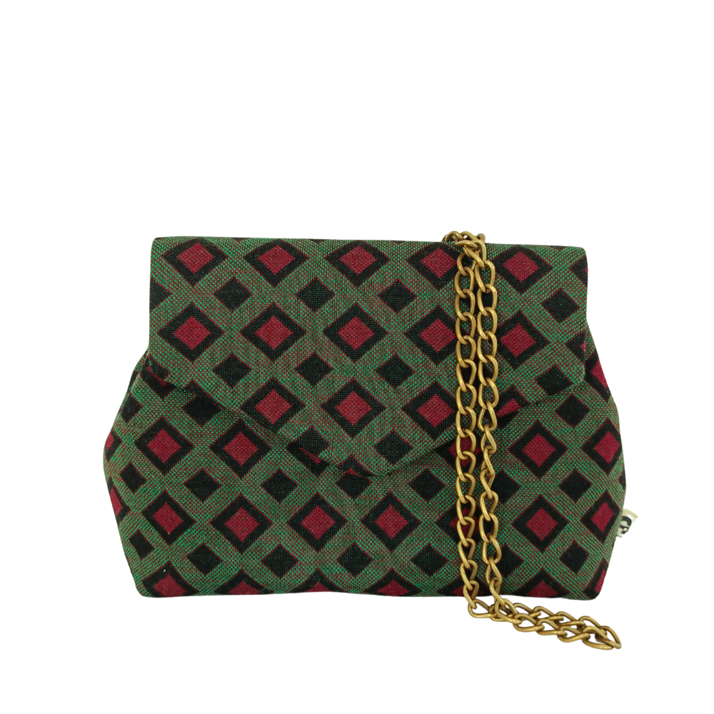 Le petit sac en tissu de la Machine à récup' est un accessoire écoresponsable et éthique, taillé dans des tissus issus du réemploi  et cousu avec la participation d'ateliers de couture solidaires.