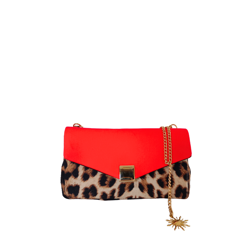 pochette bandoulière de la marque écoresponsable La Machine à récup qui revalorise des tissus avec la participation d'ateliers solidaires.