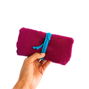 Pochette à bijoux de voyage multicolore de la marque écoresponsable La Machine à récup qui revalorise des tissus avec la participation d'ateliers solidaires.