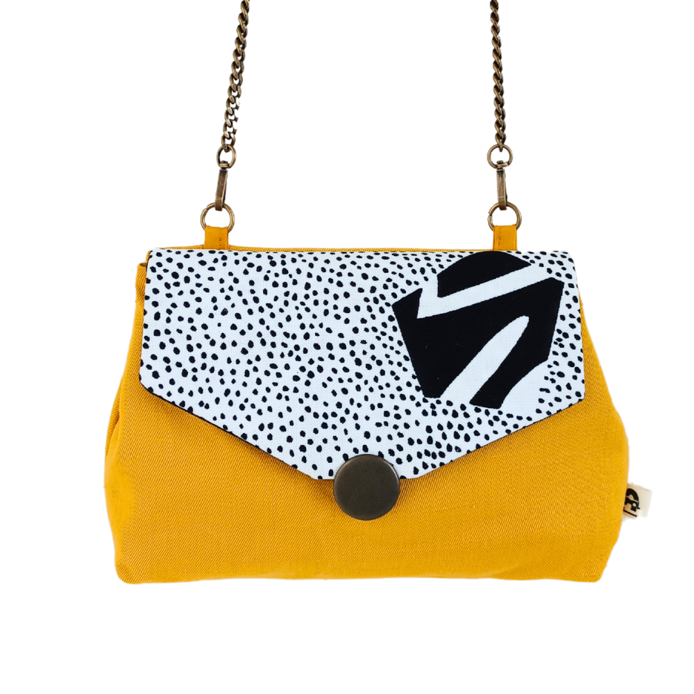sac à main chaîne femme de La Machine à récup', marque d'upcycling qui revalorise des tissus de 2nde main avec la participation d'ateliers de couture solidaires