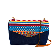 Le sac à main coloré pour femme de la Machine à récup' est un accessoire écoresponsable et éthique, taillé dans des tissus issus du réemploi  et cousu avec la participation d'ateliers de couture solidaires.