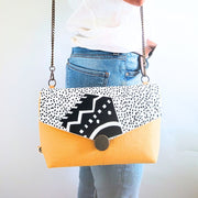 sac à main jaune de La Machine à récup', marque d'upcycling qui revalorise des tissus de 2nde main avec la participation d'ateliers de couture solidaires