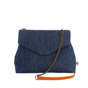 Le sac à main original femme de la Machine à récup' est un accessoire écoresponsable et éthique, taillé dans des tissus issus du réemploi  et cousu avec la participation d'ateliers de couture solidaires.