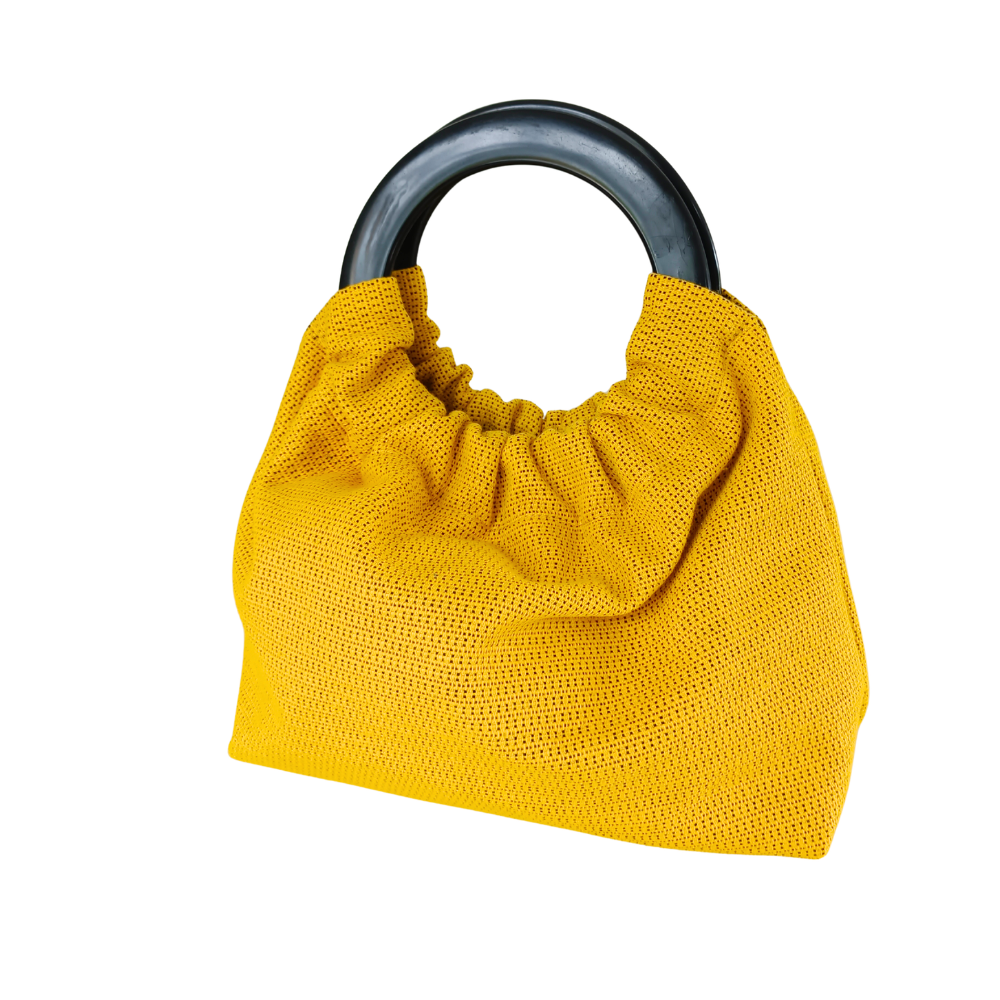 Sac à main unique de la marque écoresponsable La Machine à récup qui revalorise des tissus avec la participation d'ateliers solidaires.