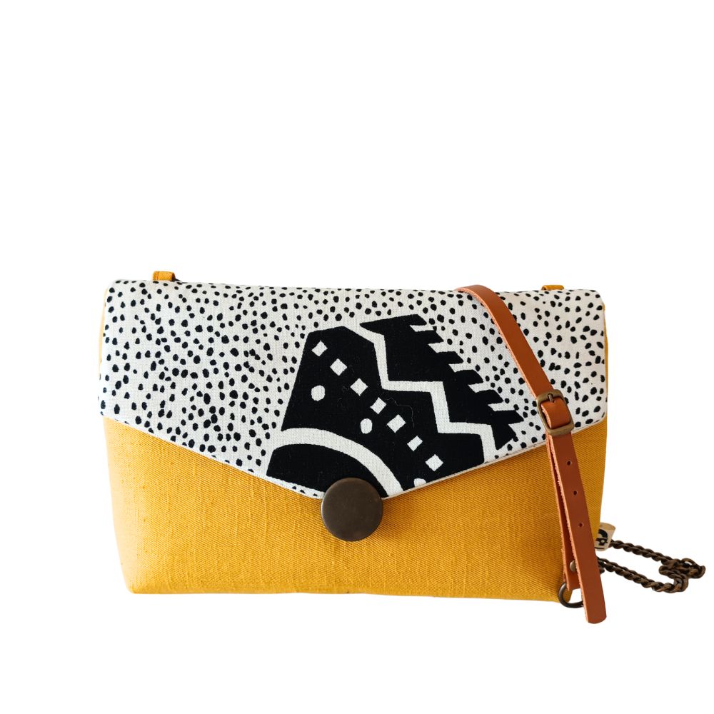 sac bandoulière chaîne de La Machine à récup', marque d'upcycling qui revalorise des tissus de 2nde main avec la participation d'ateliers de couture solidaires