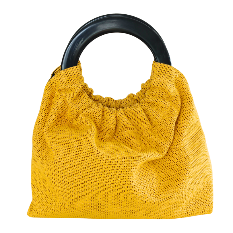 Sac à main jaune de la marque écoresponsable La Machine à récup qui revalorise des tissus avec la participation d'ateliers solidaires.