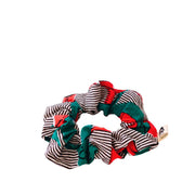 Le scrunchie mode éthique de la Machine à récup' est un accessoire conçu avec des tissus issus du réemploi et cousu avec la participation d'ateliers de couture solidaires en Sarthe