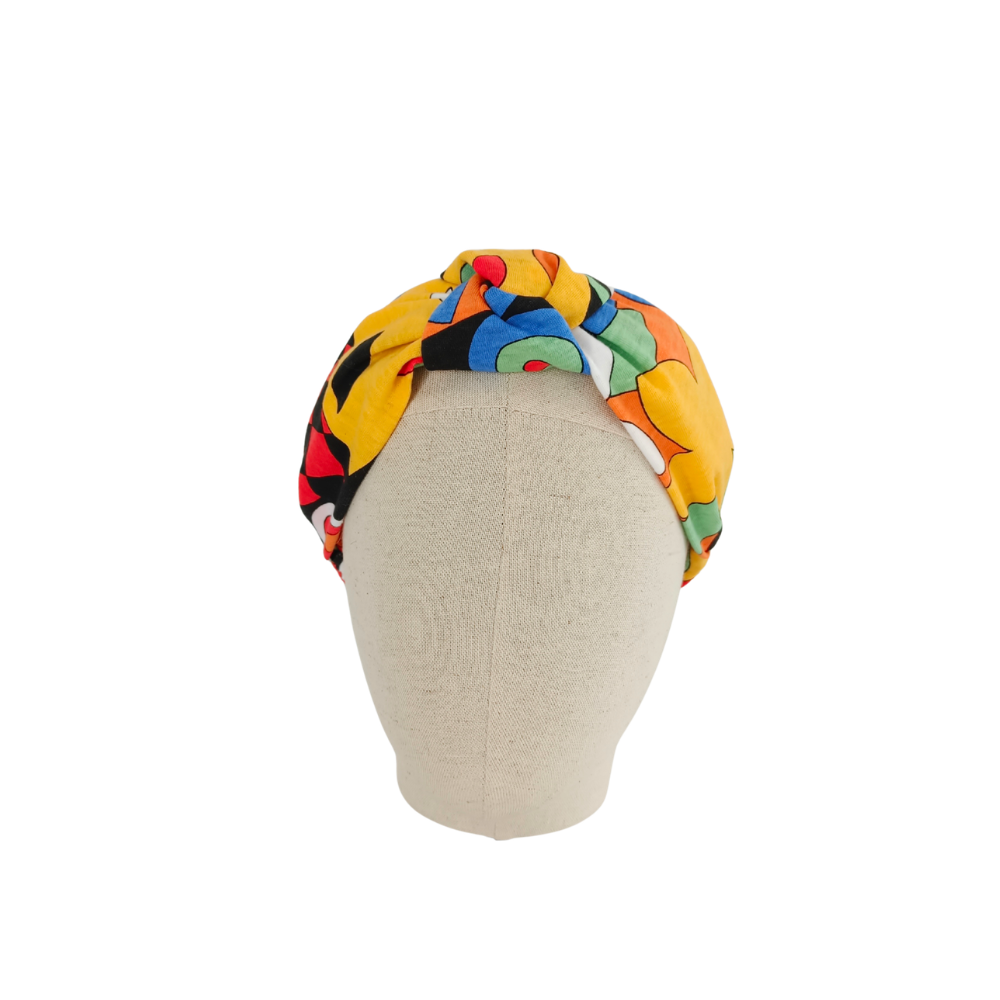 serre-tête cheveux bouclés de la marque écoresponsable La Machine à récup qui revalorise des tissus avec la participation d'ateliers solidaires.