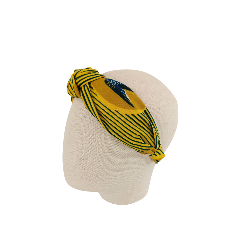 serre tête jaune de la marque écoresponsable La Machine à récup qui revalorise des tissus avec la participation d'ateliers solidaires.