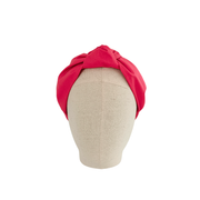 serre tête rose de la marque écoresponsable La Machine à récup qui revalorise des tissus avec la participation d'ateliers solidaires.